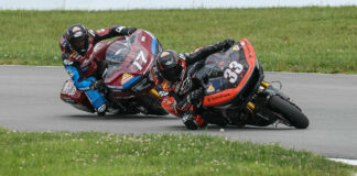 Kyle Wyman (33) and Troy Herfoss (17) are battling for the Mission King Of The Baggers Championship. Photo by Brian J. Nelson, courtesy MotoAmerica.