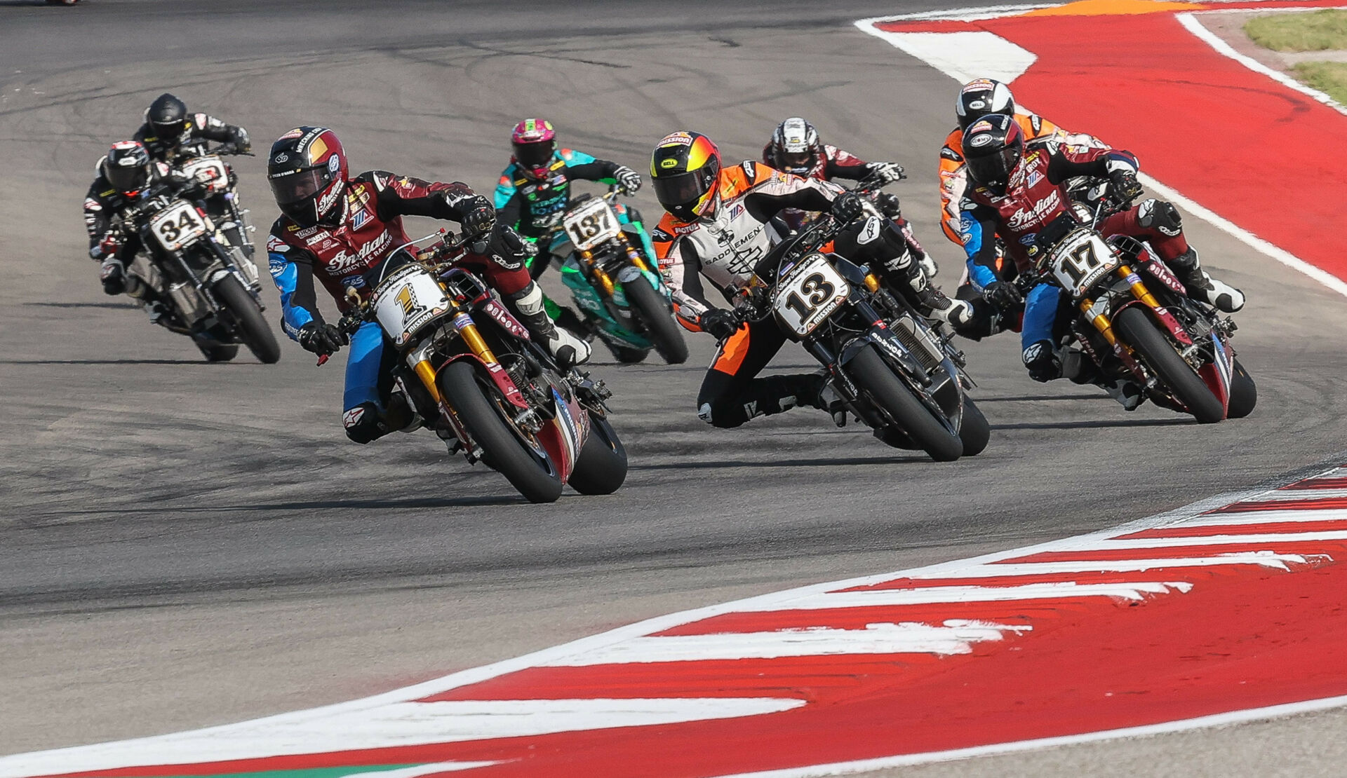 Tyler O'Hara (1), Cory West (13), Troy Herfoss (17), and the rest of the field at the start of Super Hooligan Race Two at COTA. Photo by Brian J. Nelson.