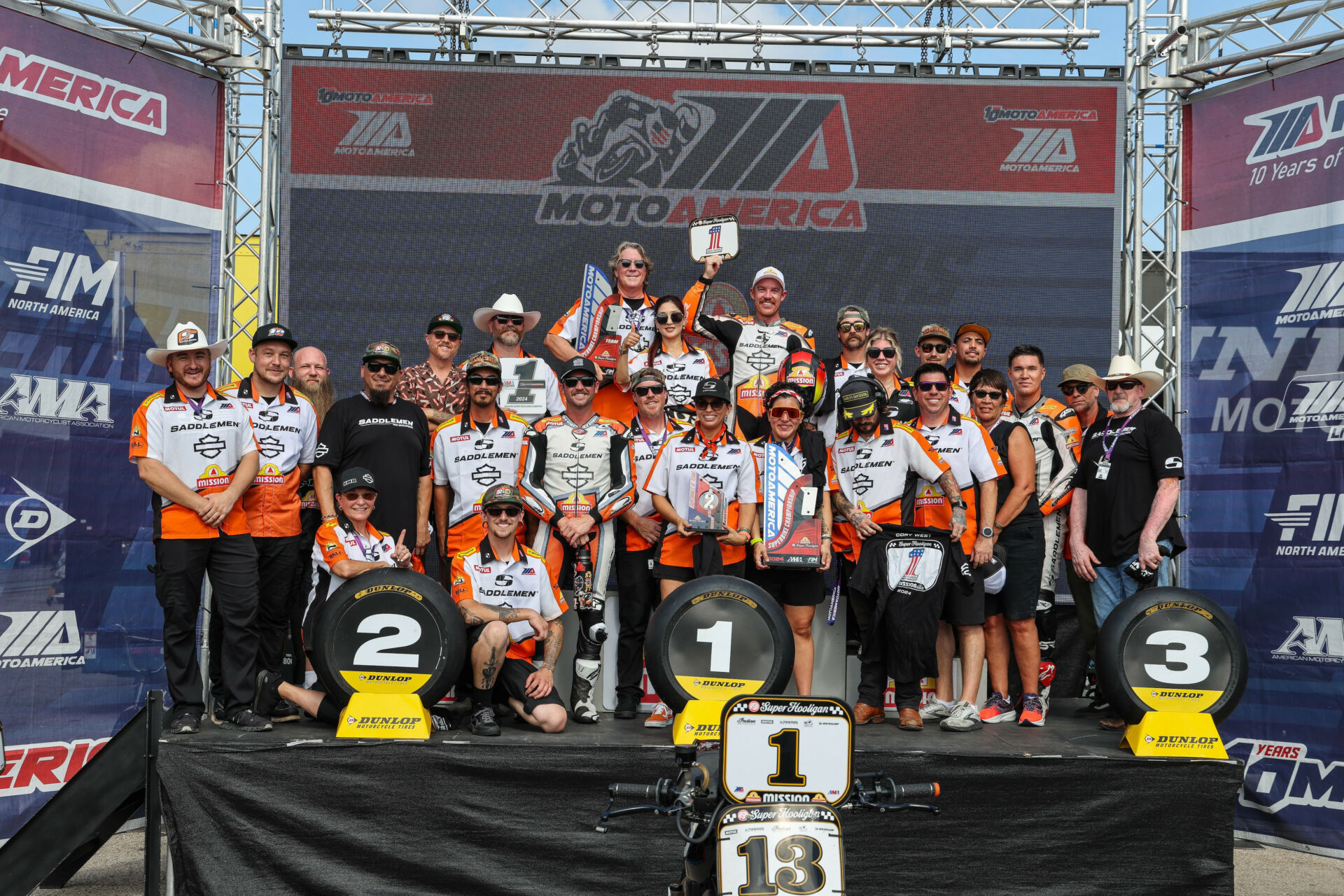 Cory West (back row holding #1 plate) won the 2024 MotoAmerica Super Hooligan Championship. Photo by Brian J. Nelson, courtesy Harley-Davidson.