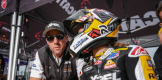 Rahal Ducati Moto Team Principal Ben Spies (left) talks with rider Kayla Yaakov (right) on pit wall at Mid-Ohio. Photo by Brian J. Nelson.