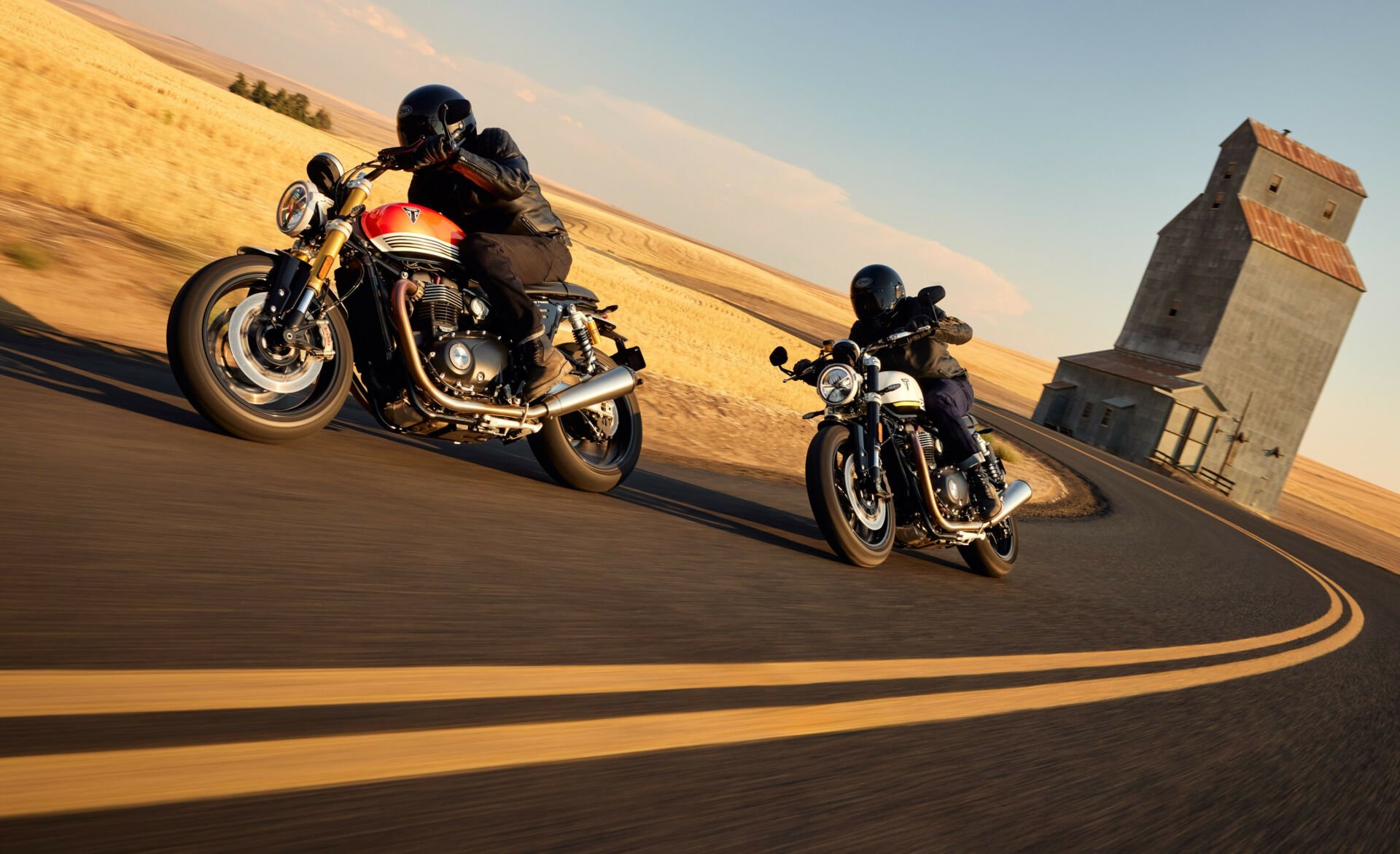 A 2025 Triumph Speed Twin 120 RS followed by a 2025 Triumph Speed Twin 1200. Photo courtesy Triumph.