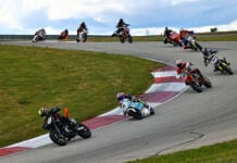 Steve Alexander (43) leads Ralph Staropoli (80), Noel Korowin (510), Bruce Testa (954), Paul Elledge (133), Adrian Jasso (12), Chloe Maddrill (456), Frank Schoenbeck (25) and the rest during an AHRMA race at PittRace. Photo by etechphoto.com, courtesy AHRMA.