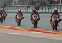 American Kristian Daniel Jr. (70) chases Championship point leader Alvaro Carpe (83) during a Red Bull MotoGP Rookies Cup race at MotorLand Aragon. Photo courtesy Kristian Daniel Sr.