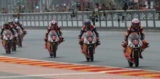 American Kristian Daniel Jr. (70) chases Championship point leader Alvaro Carpe (83) during a Red Bull MotoGP Rookies Cup race at MotorLand Aragon. Photo courtesy Kristian Daniel Sr.