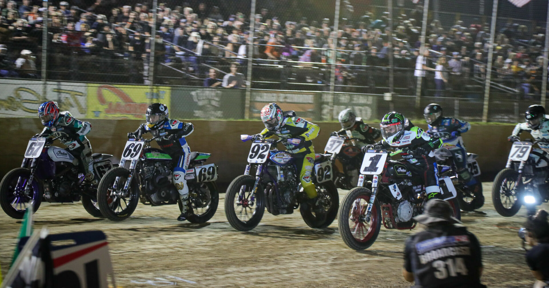 Davis Fisher (67), Sammy Halbert (69) , Brandon Price (92), and Jared Mees (1) lined up in front of a big crowd at the Lake Ozark Short Track. Photo by Scott Hunter, courtesy AFT.