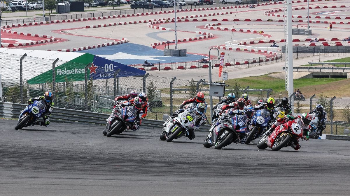 Josh Herrin (2) leads Cameron Beaubier (6), Sean Dylan Kelly (40), Xavi Forés (34), JD Beach (95), and the rest of the Steel Commander Superbike class into turn one on Saturday at Circuit of The Americas. Photo by Brian J. Nelson.