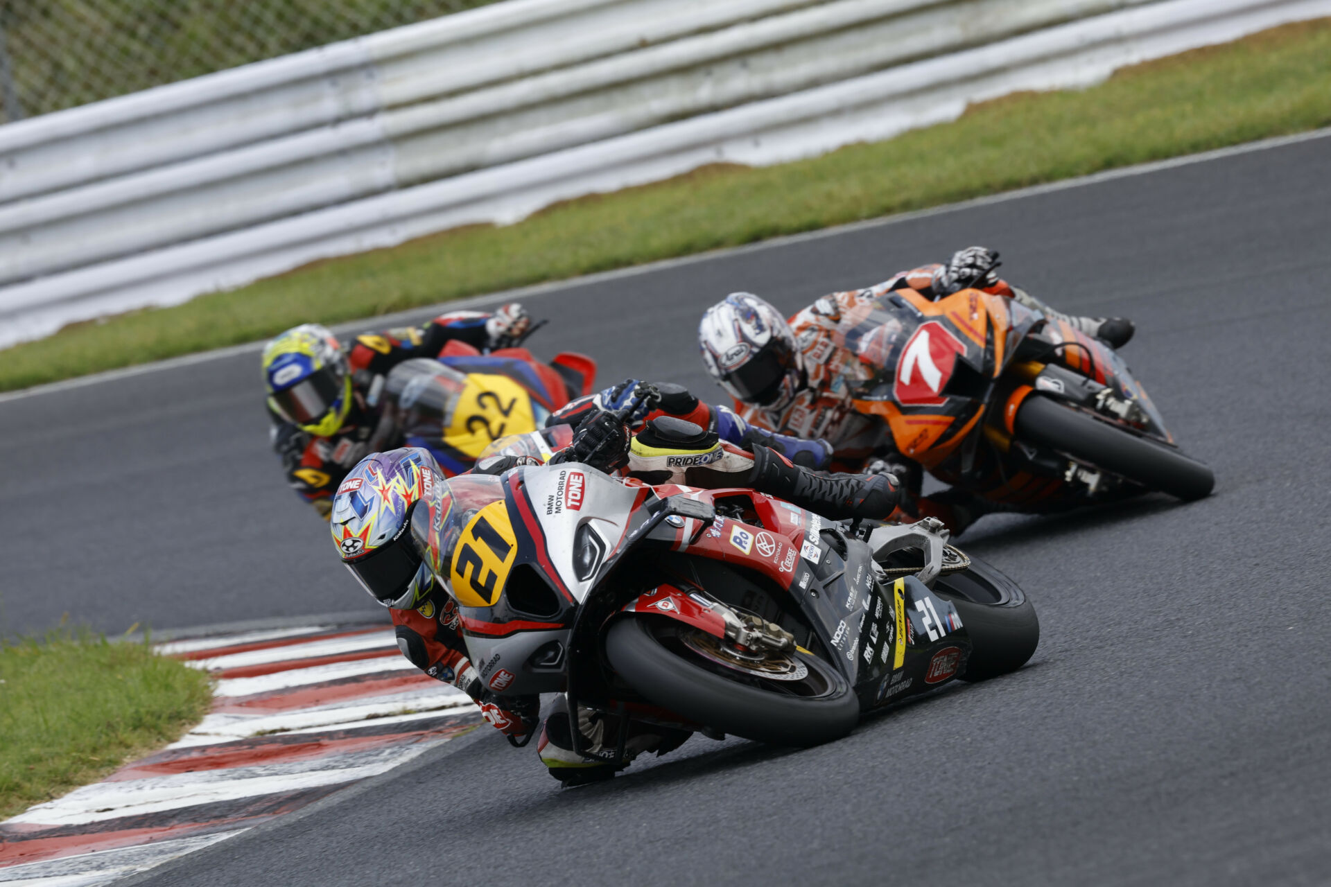 Tomoya Hoshino (21) in action at Autopolis. Photo courtesy TONE RT SYNCEDGE 4413 BMW.