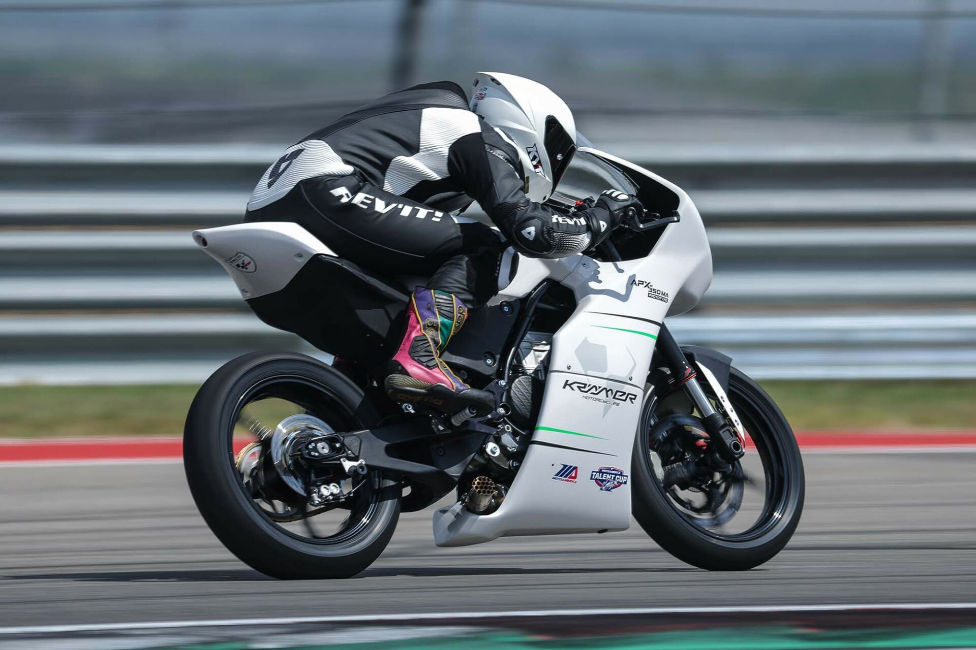 Krämer test rider Finn Chapman onboard the Krämer APX-350 MA prototype at the Circuit of The Americas, wearing a REV'IT! suit and gloves. Photo by Brian J. Nelson, courtesy Krämer Motorcycles.