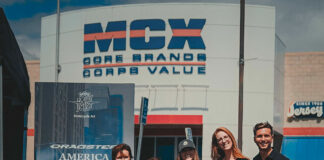 From left, MV Agusta North America Sales Manager Cindy Bashaw-Downing; Corporate Sales-Marketing Executive Stephanie Sancedo; Marketing Manager Olivia Goheen; Corporate Sales-Marketing Executive Misty Breymeyer, and General Manager Luca Dovesi pose with the MV Agusta Dragster RR SCS America donated to a drawing held at Camp Pendleton Marine Base. Cpl. Kimo Malott won the drawing.