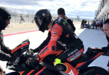 American Rossi Moor's second test day was cut short by blustery winds. Here, his bundled-up crew starts his Moto2 racebike. MMR Racing Photo.