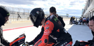 American Rossi Moor's second test day was cut short by blustery winds. Here, his bundled-up crew starts his Moto2 racebike. MMR Racing Photo.