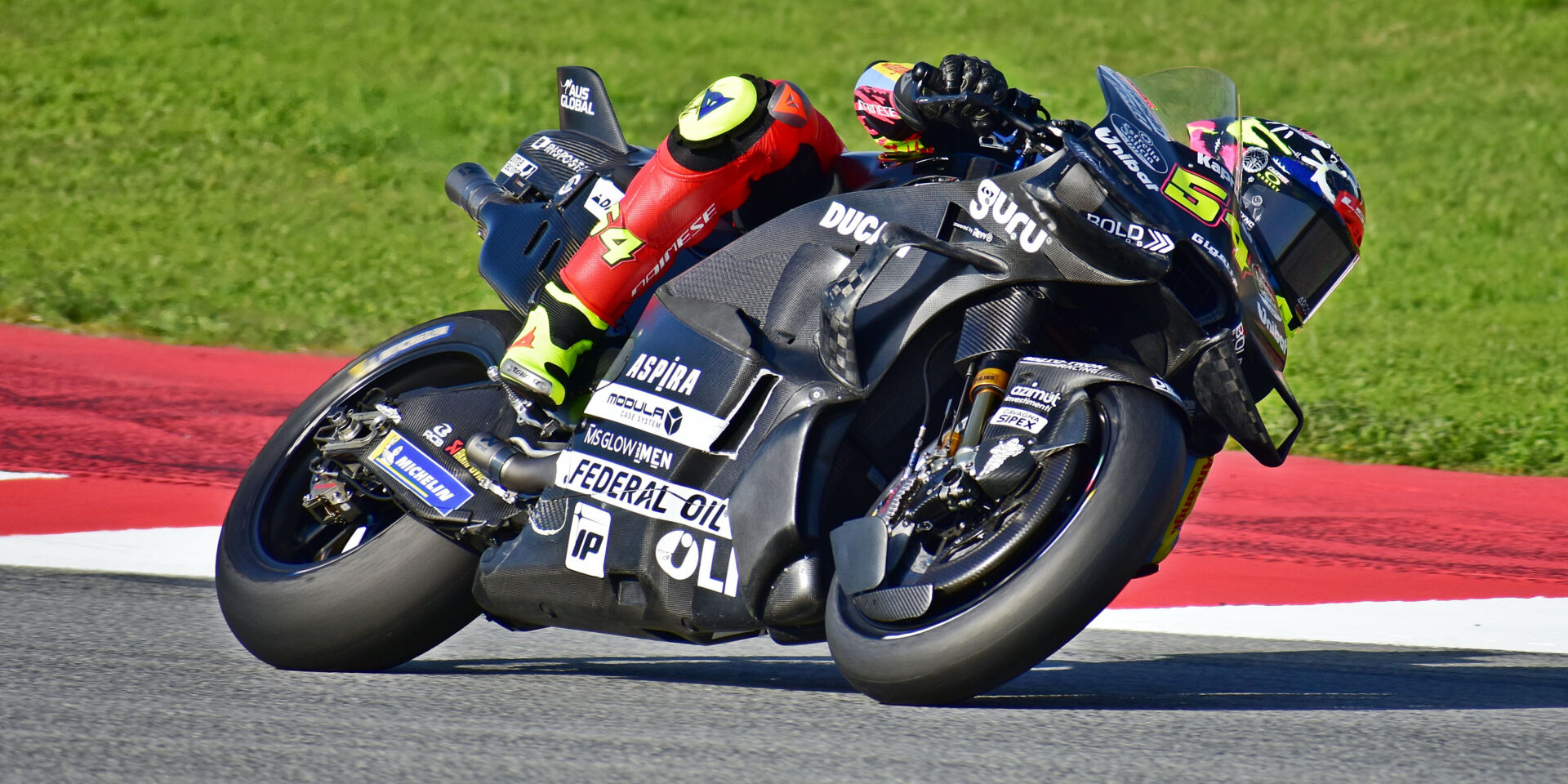 Fermin Aldeguer (54) testing a Ducati GP24 at Barcelona. Photo by Michael Gougis.