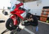 Melissa Paris working on an MV Agusta F3-800