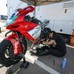 Melissa Paris working on an MV Agusta F3-800