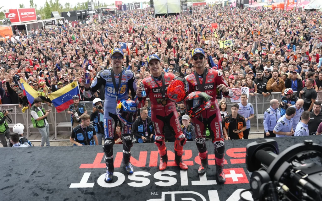 Sprint race podium from left to right, Alex Marquez, Marc Marquez and Francesco Bagnaia. Photo courtesy Dorna. 