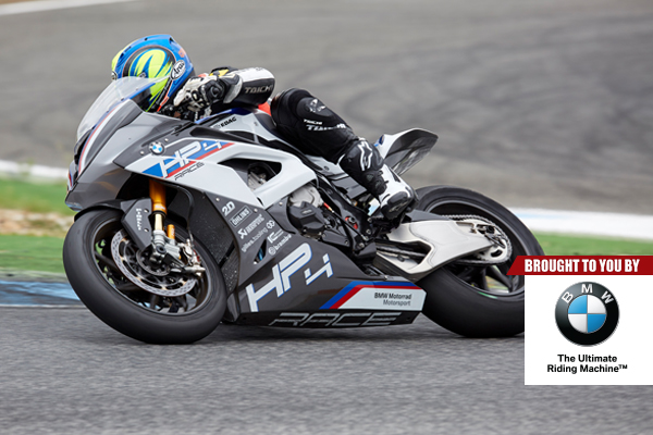 Bmw Hp4 Race Riding Fast On Bmw S 215 Horsepower Carbon Fiber Masterpiece At Circuito Estoril In Portugal Roadracing World Magazine Motorcycle Riding Racing Tech News