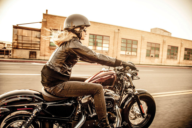 Woman discount riding motorbike